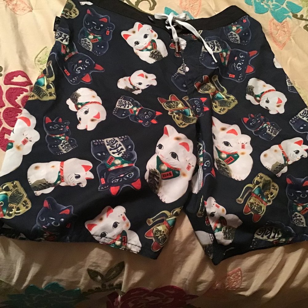 MENS SIZE 32  VANS SWIMMING TRUNKS